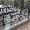 Advantages of a metal fence for a grave